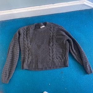 Small charcoal colored sweater